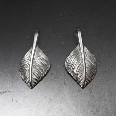 L flight heart feather