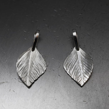 L flight heart feather