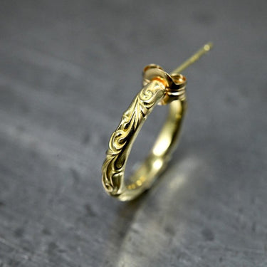 K18 arabesque ring pierce