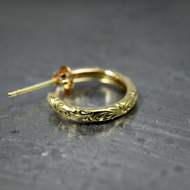 K18 arabesque ring pierce